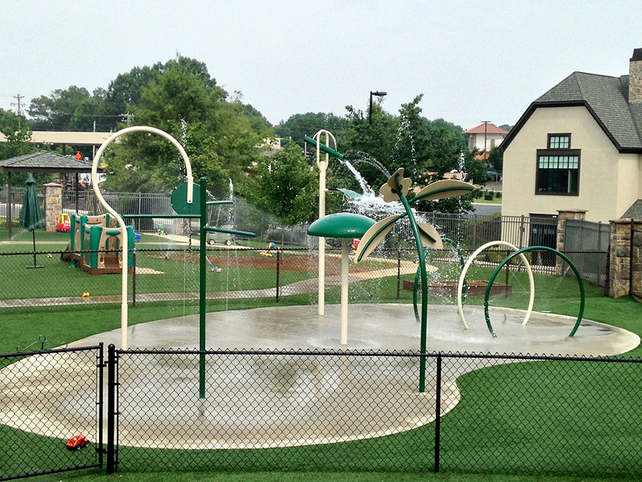 Splash Pad Water Park - a modest upgrade to the hot summer days when we used a water hose and sprinkler for water-play.