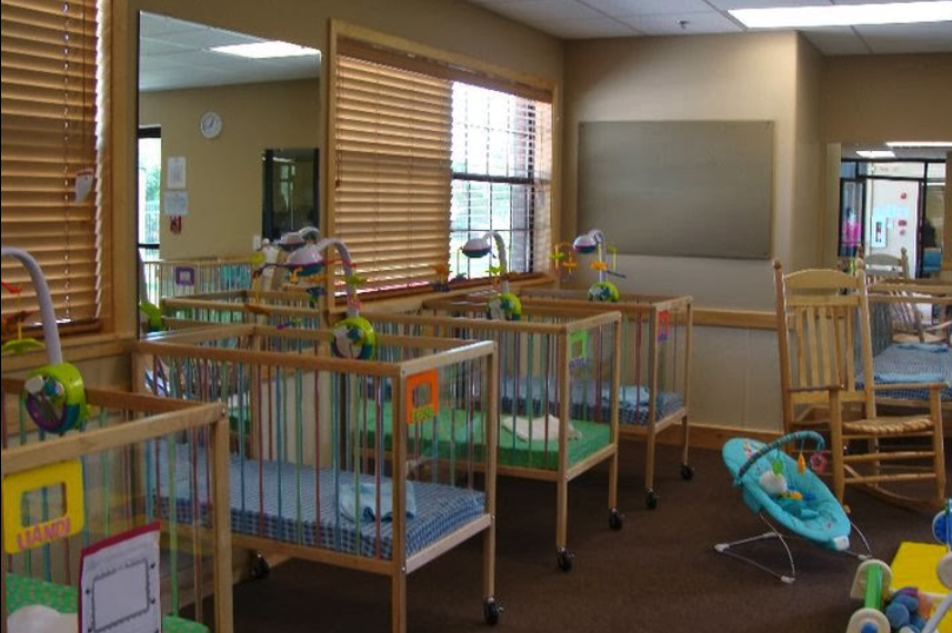 Our infant room is quiet, cozy and has lots of space for little ones to play and discover.