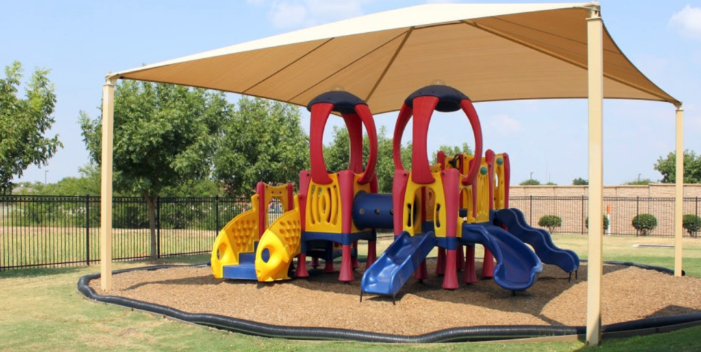 Every age child can have fun outside on our age appropriate  covered playgrounds!