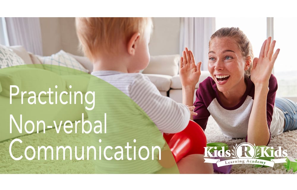 Blog image of mom giving hand signals to child